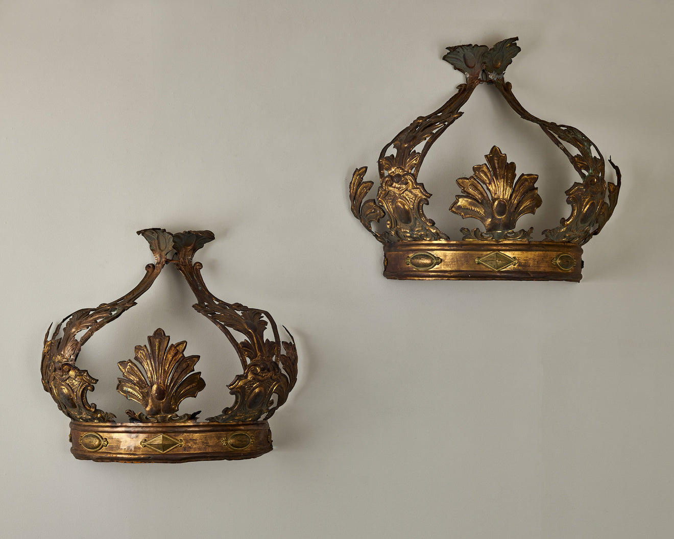 PAIR OF BRASS REPOUSSE CROWN CORONETS